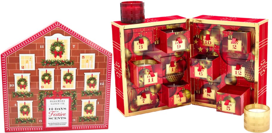 Two HomeWorx by Slatkin holiday candle advent calendars displayed side by side, featuring a house-shaped countdown box on the left and an open red-and-gold cabinet-style advent calendar with numbered drawers on the right.
