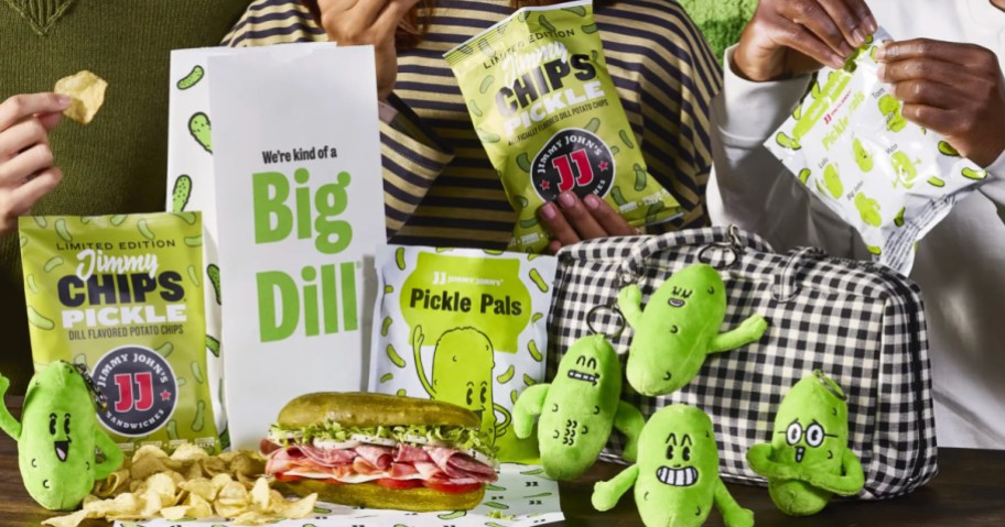 People eating Jimmy John's picklewich meal surrounded by five mystery collectibles