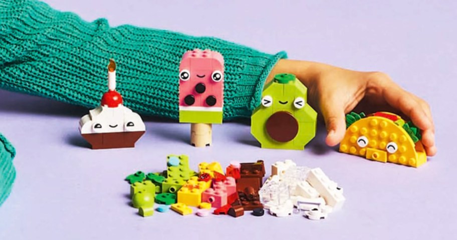 lego foods with faces with a pile of more bricks in front of them