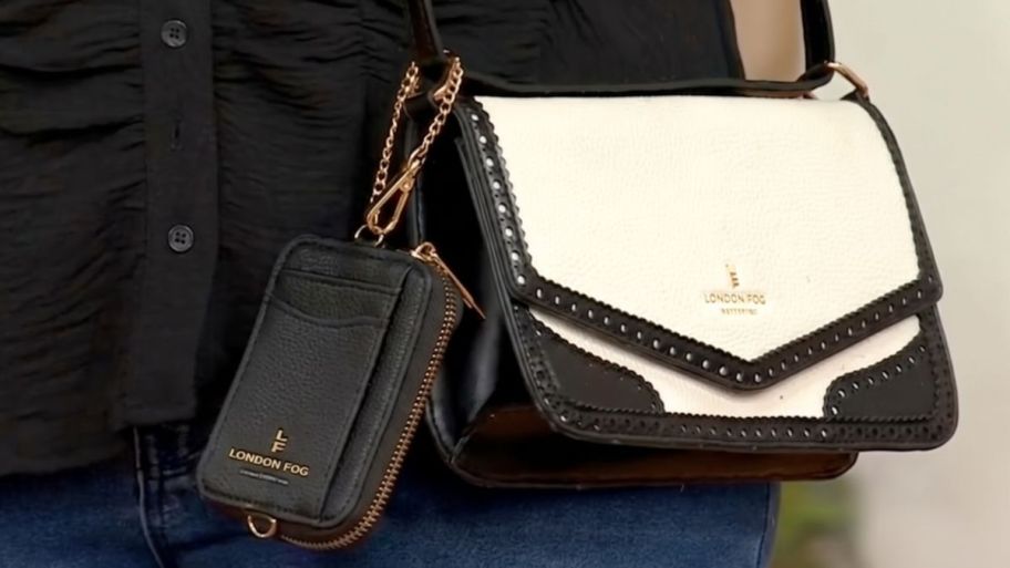 London fog coil purse in balck with another purse next to it