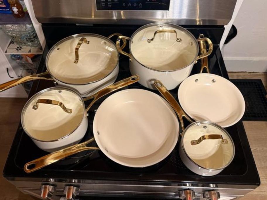 Martha Stewart Lockton 10-Piece Ceramic Nonstick Aluminum Cookware Set on stove