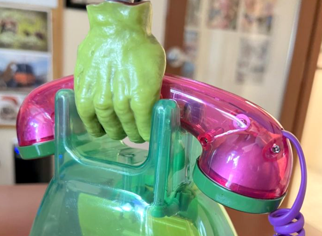 holding monster phone
