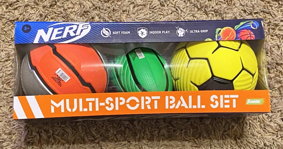 pack of nerf sports balls on carpet