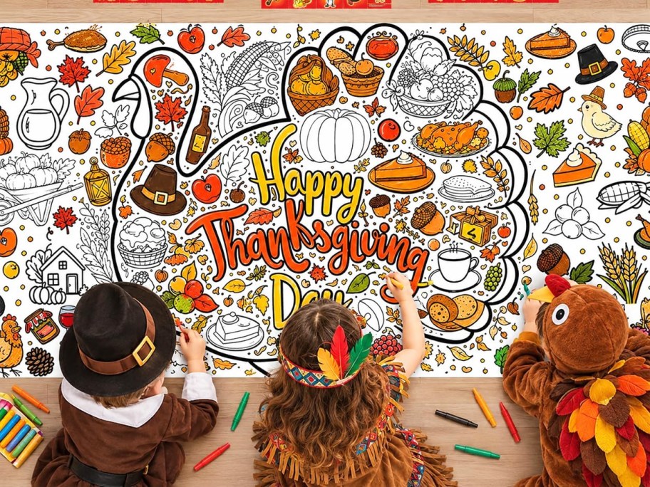 kids coloring a giant thanksgiving poster