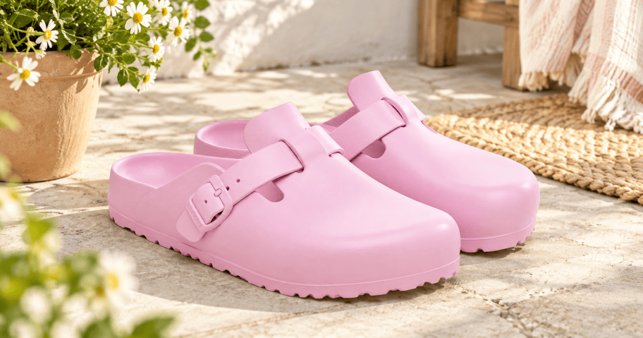 Pink Birkenstock Clogs on a Sunlit Patio