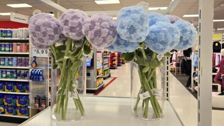 Plush flowers in vase at the store with purple and blue