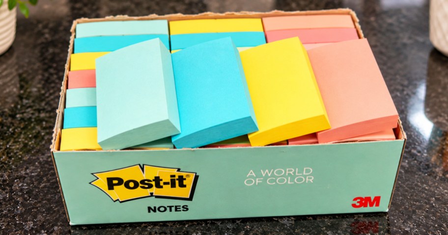 box of colorful post-it notes