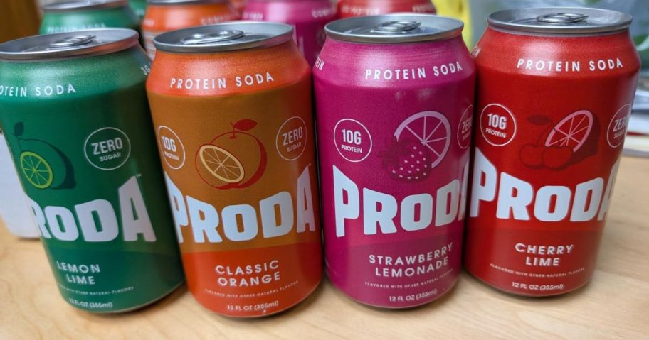Proda Protein Soda cans on table