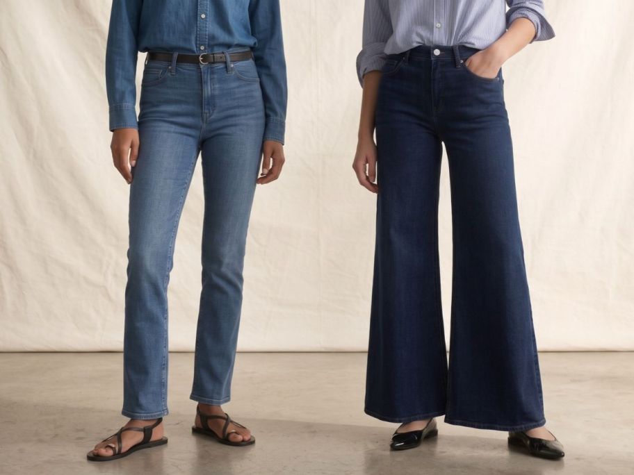 two women wearing quince jeans