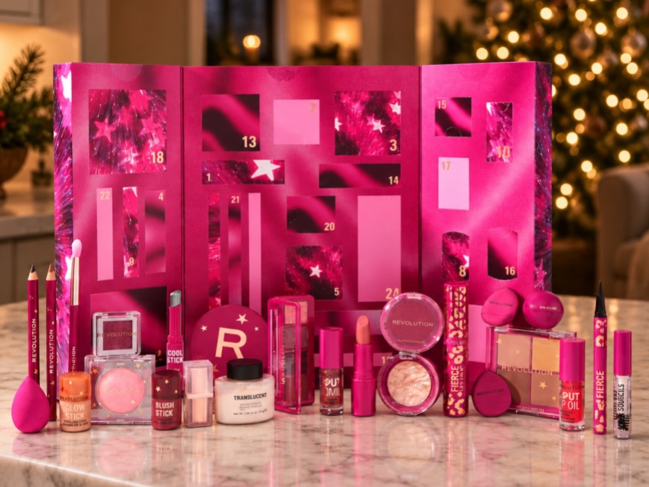 pink makeup advent calendar open with contents on countertop