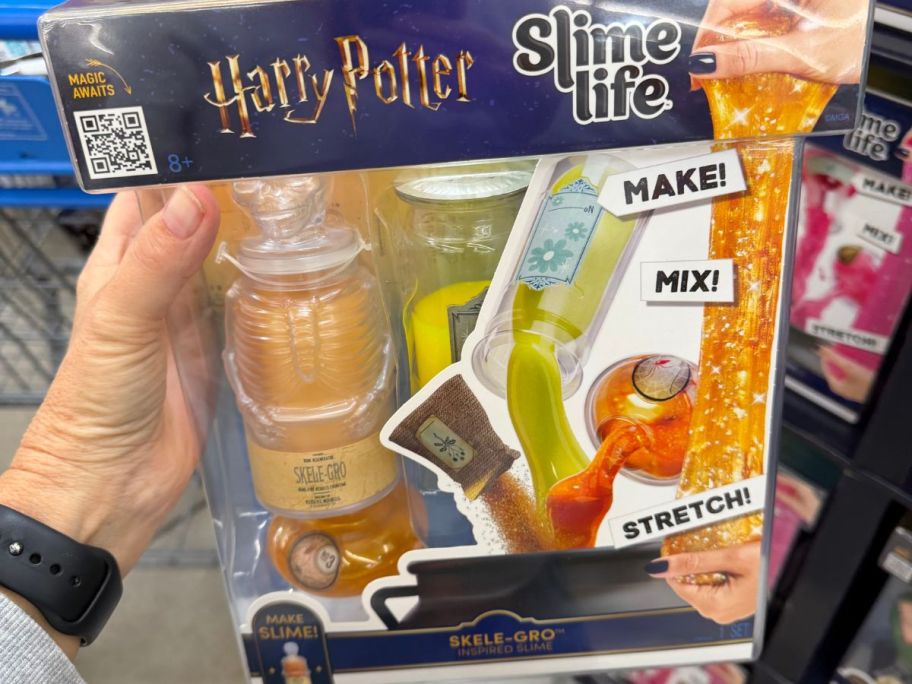 Slime Life Harry Potter Skele-Grow Potion in hand in store