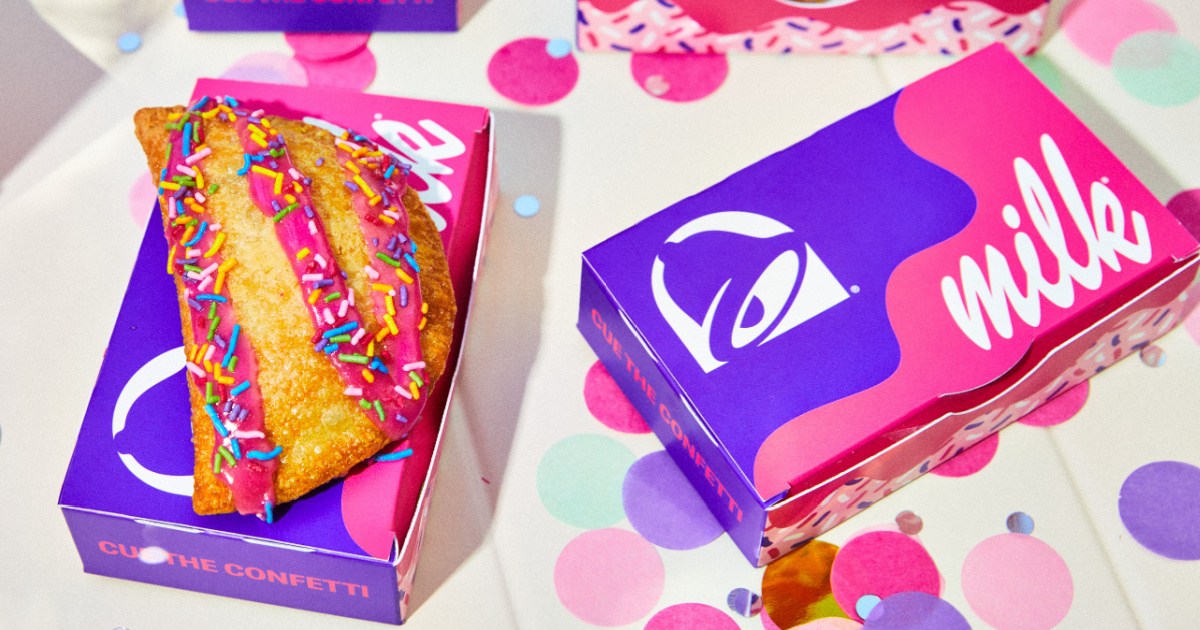 Taco Bell milk bar empanada with pink frosting and rainbow sprinkles