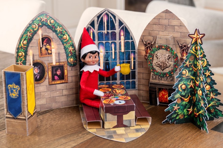 elf sitting in Howgarts pop-up scene