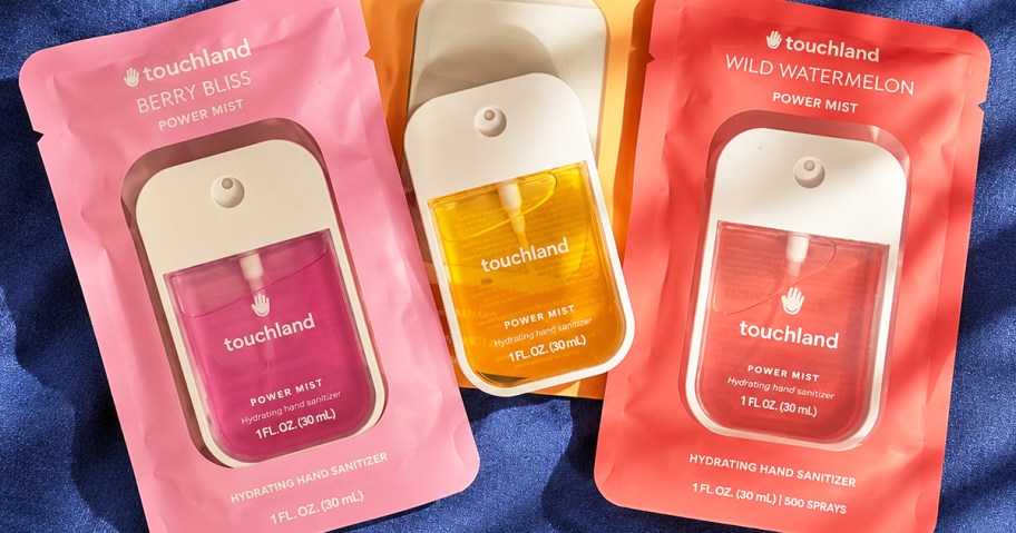 3 bottles of Touchland Hand Sanitizers