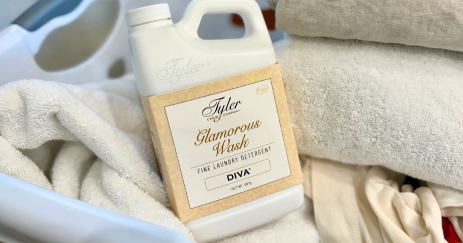 Tyler Candle Company’s Glamorous Wash bottle in laundry basket