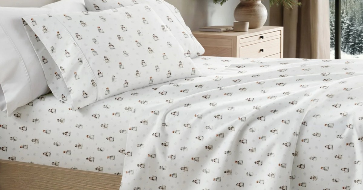 Vintage snowman sheets on bed