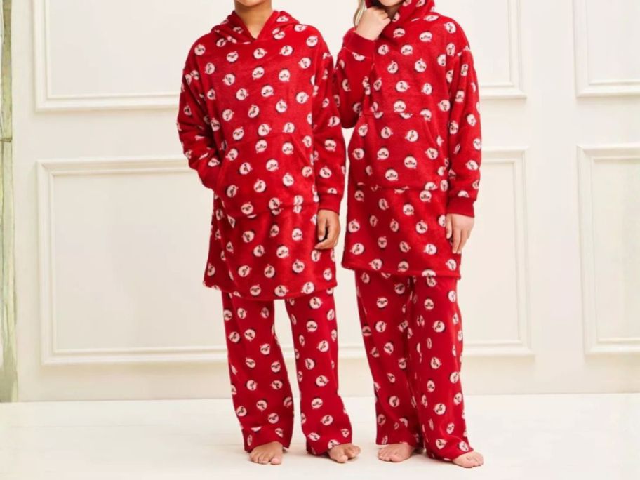 two kids wearing Wondershop Sheep Holiday Matching Kids Hoodies