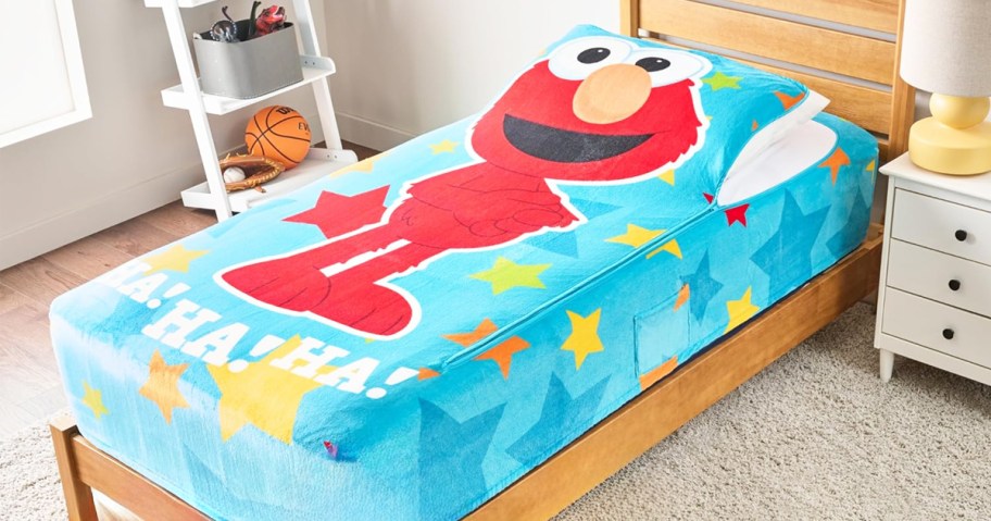 elmo zip-up bedding on a kids bed