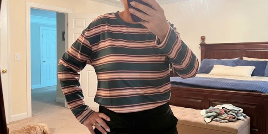 woman wearing long sleeve striped tee