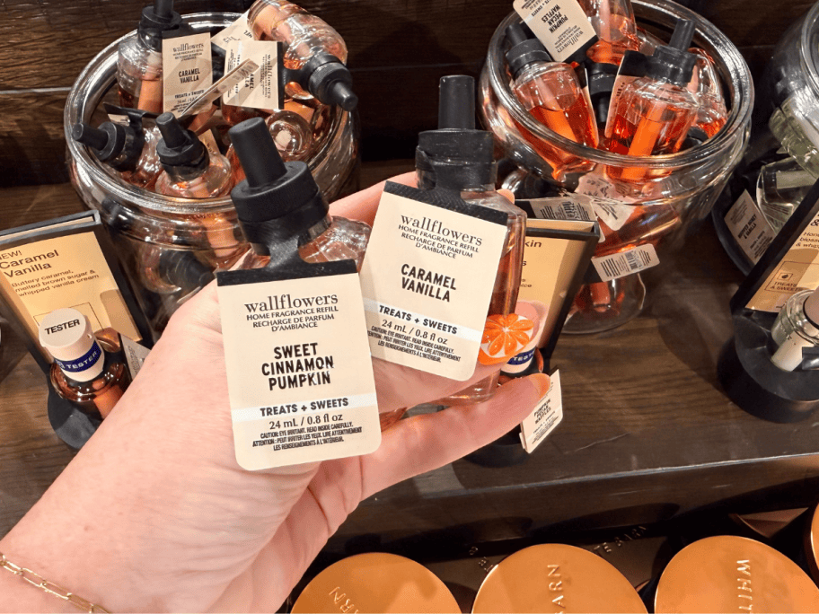 hand holding wallflowers at bath & body works