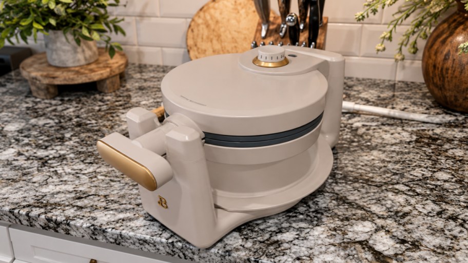 a porcini colored belgian waffle maker on a kitchen counter top