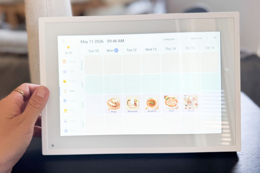 hand touching digital calendar with meal plan