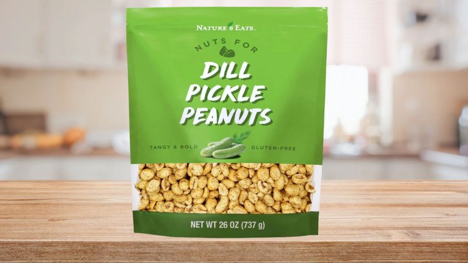 dill pickle peanuts with items on top of the table