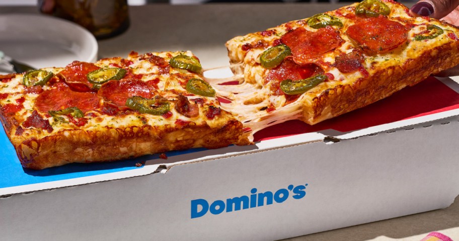 A Domino's Domino pizza split in half.
