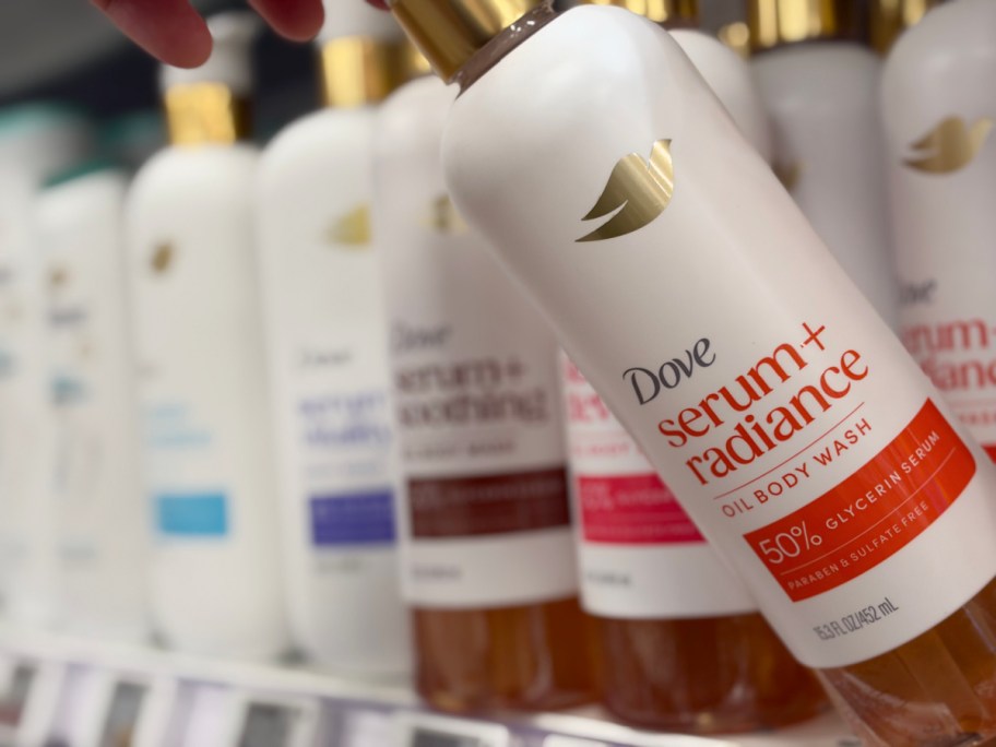 bottles of dove serums on a store shelf