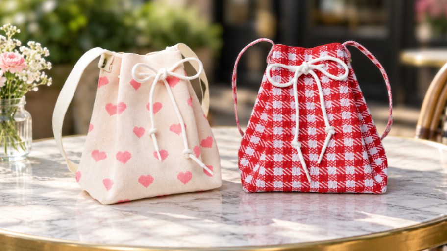 drawstring bags on a bistro table