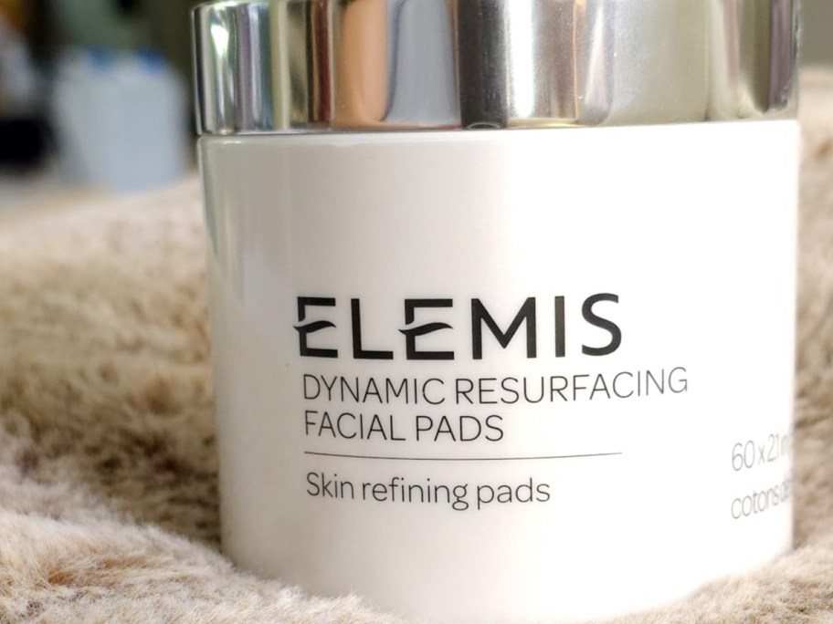 elemis facial pads jar on blanket