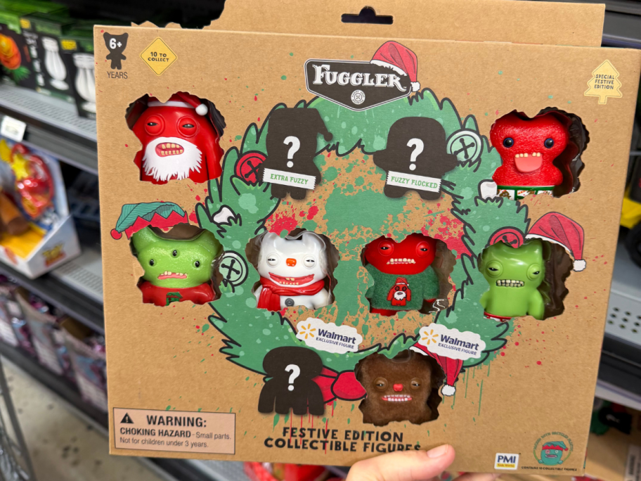 hand holding fuggler christmas box