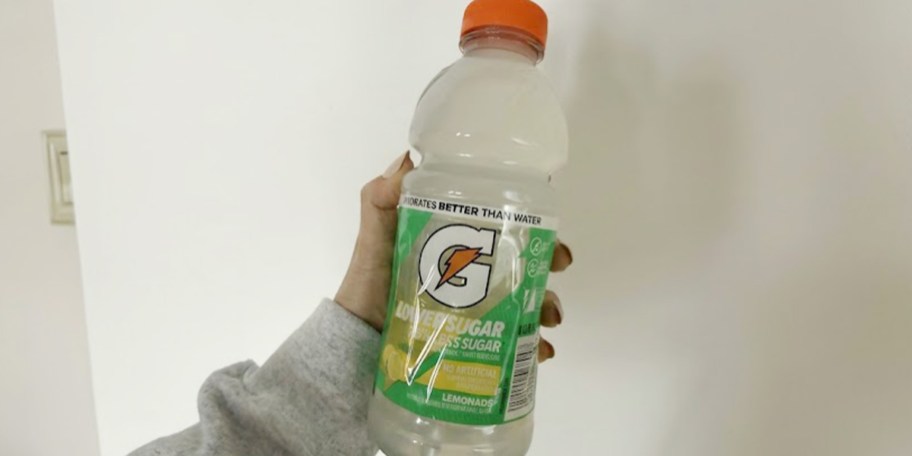 hand holding gatorade bottle