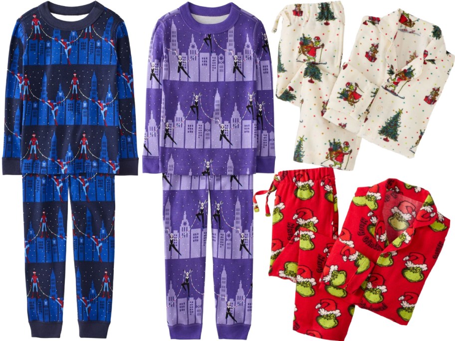 Four sets of children's holiday pajamas, featuring a blue Spider-Man city skyline print on the left, a purple Spider-Gwen city skyline print next to it, an off-white Grinch button-down pajama set on the top right, and a red Grinch button-down pajama set on the bottom right.