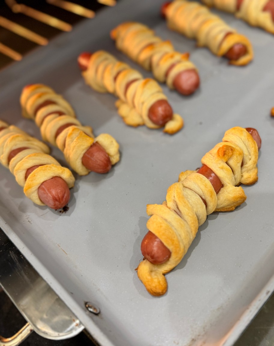 mummy hot dogs coming out of the oven
