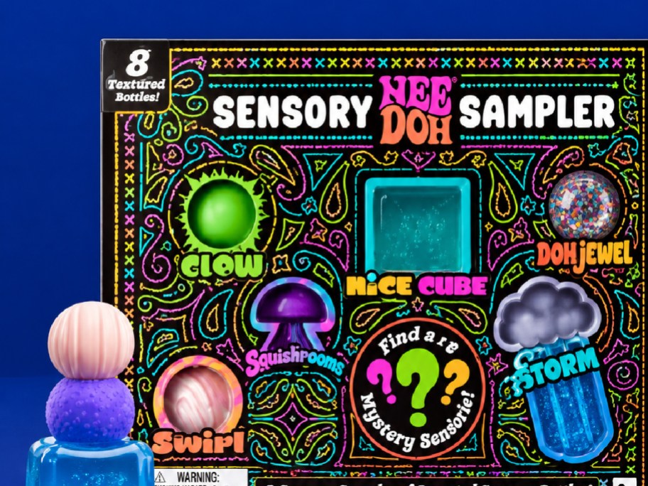 needoh sampler box with stacked needohs next to it
