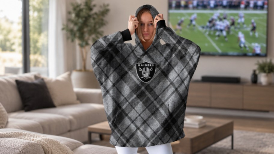 woman in an nfl team sherpa hoodie