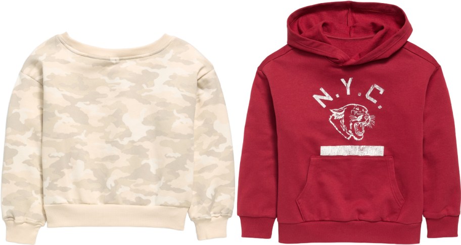 Two Old Navy kids' sweatshirts, featuring a cream and beige camouflage-patterned crewneck sweatshirt on the left and a maroon hooded sweatshirt with a distressed "N.Y.C." panther graphic and front pocket on the right.