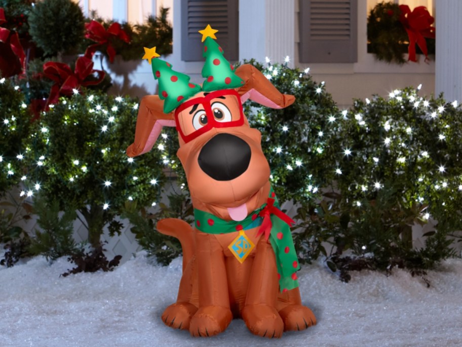 inflatable scooby do in snowy yard