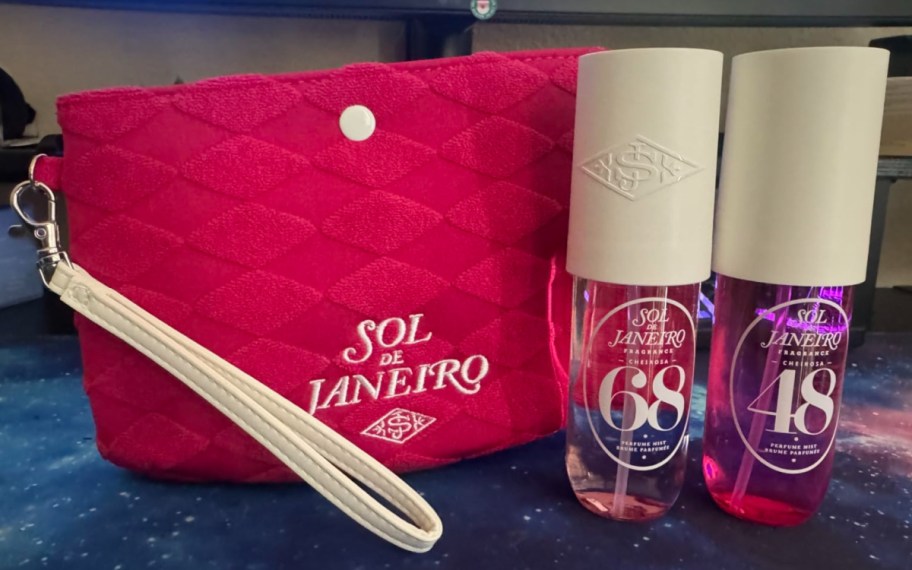 small pink pouch with two small sprays