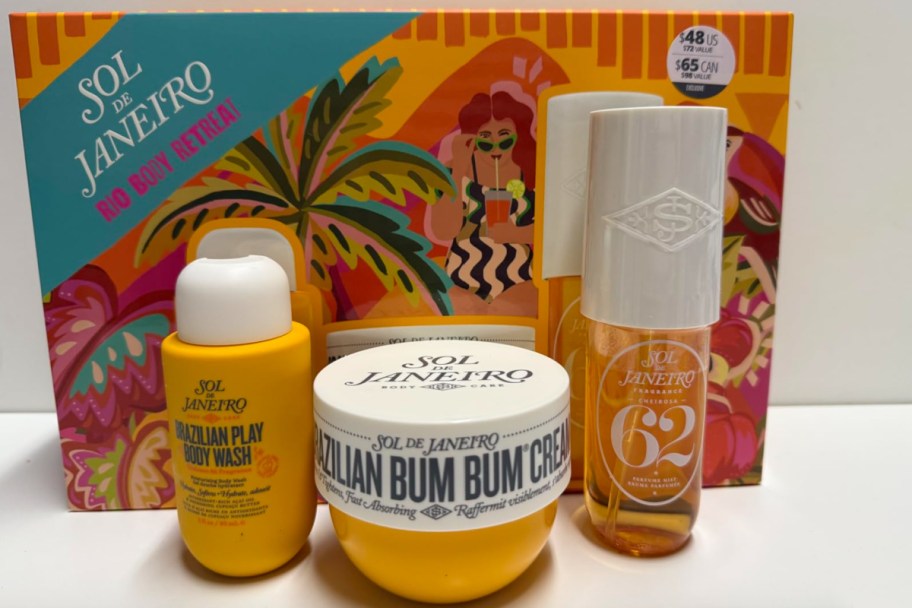 gft set with yellow body cream, mist, and lotion tube