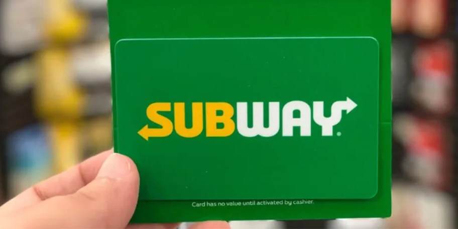 hand holding subway giftcard