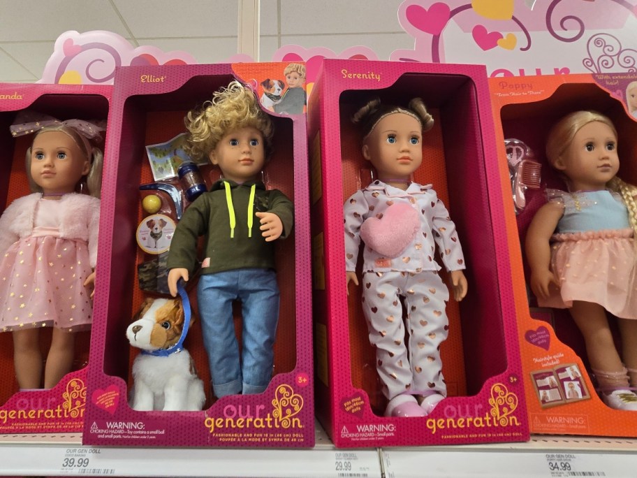 dolls in pink boxes on store shelf