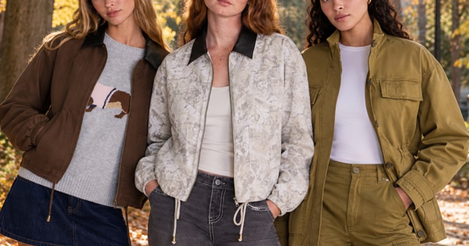 3 women wearing different styles of barn jackets