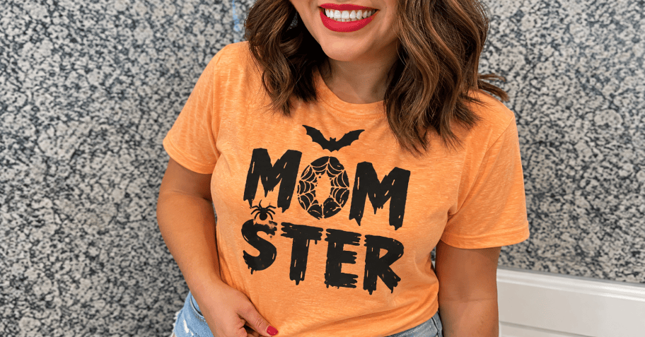 woman wearing an orange halloween tee