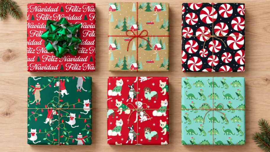 6 christmas gfts wrapped in 6 different gift wrap designs